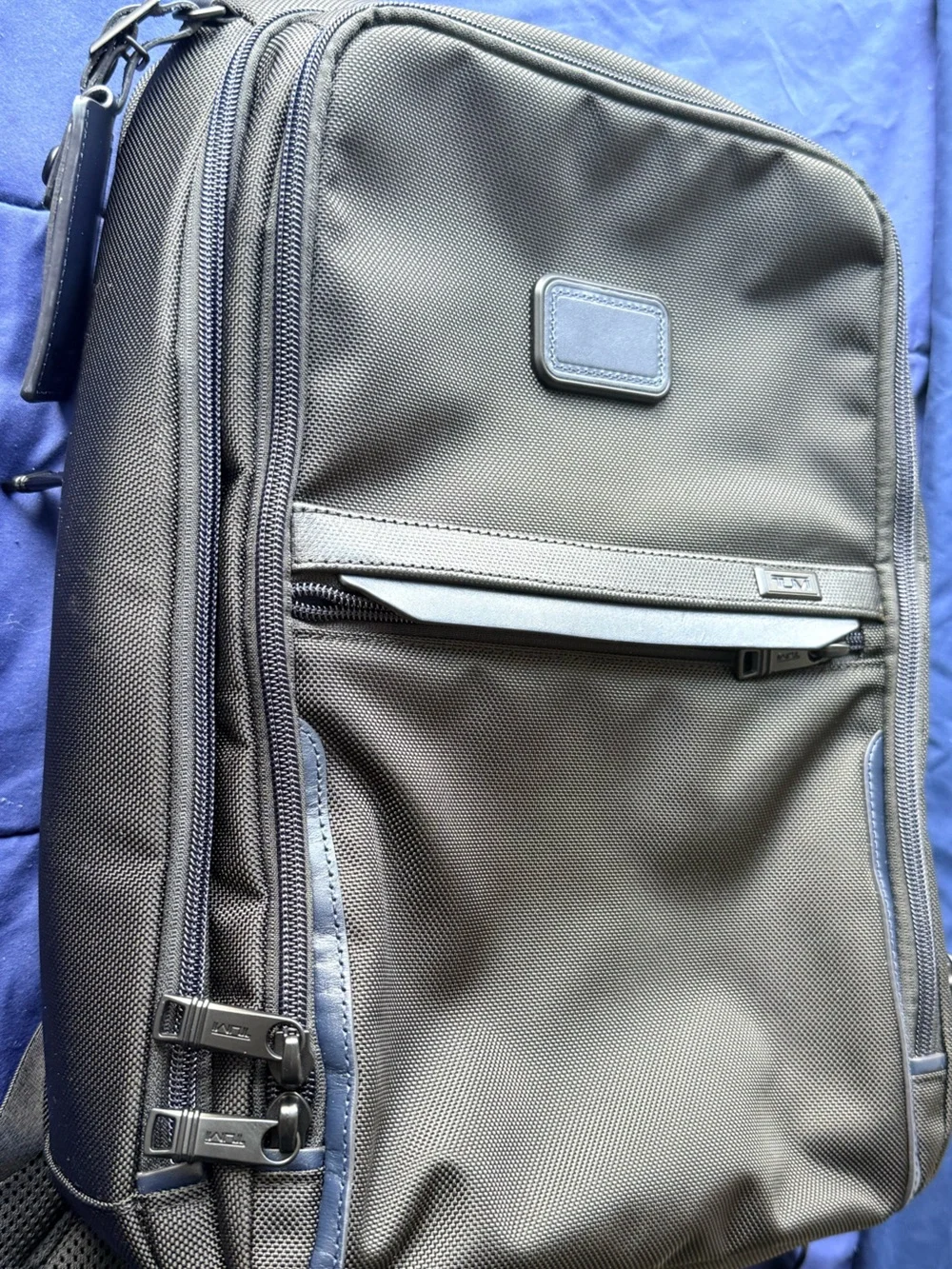 Tumi Black Bag with Red Limited-Edition Tag